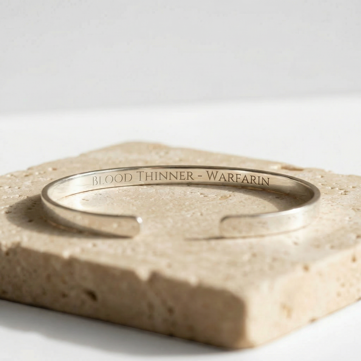 Sterling silver medical alert cuff bracelet with text inside